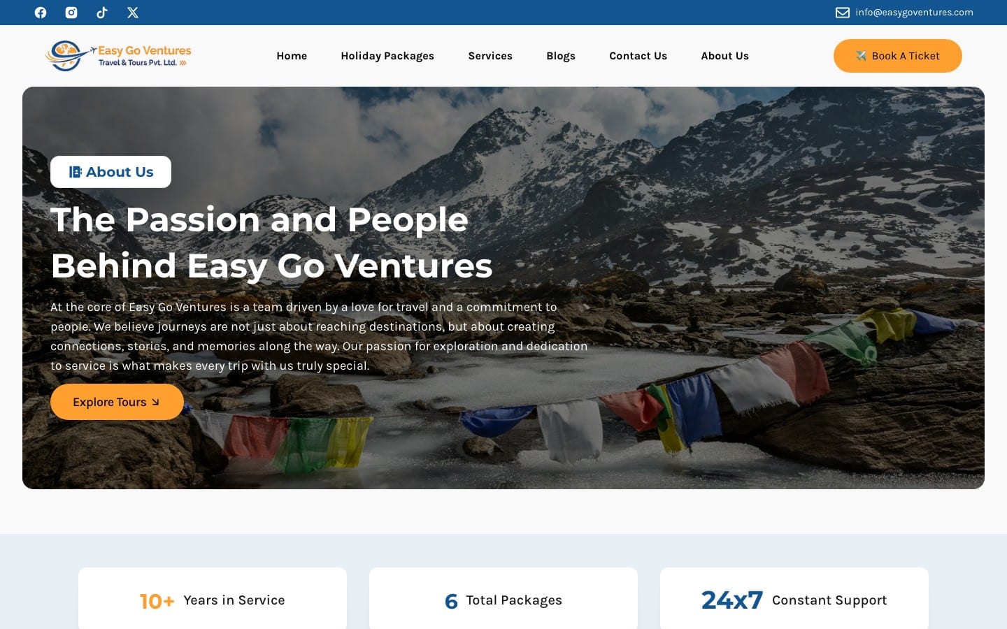 Easy Go Ventures About Us page with a Himalayan prayer-flag banner